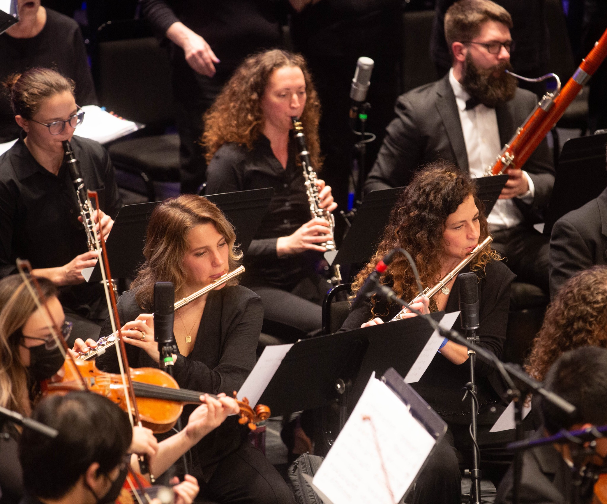 Abigail Walsh performing flute with the Illinois Symphony Orchestra.